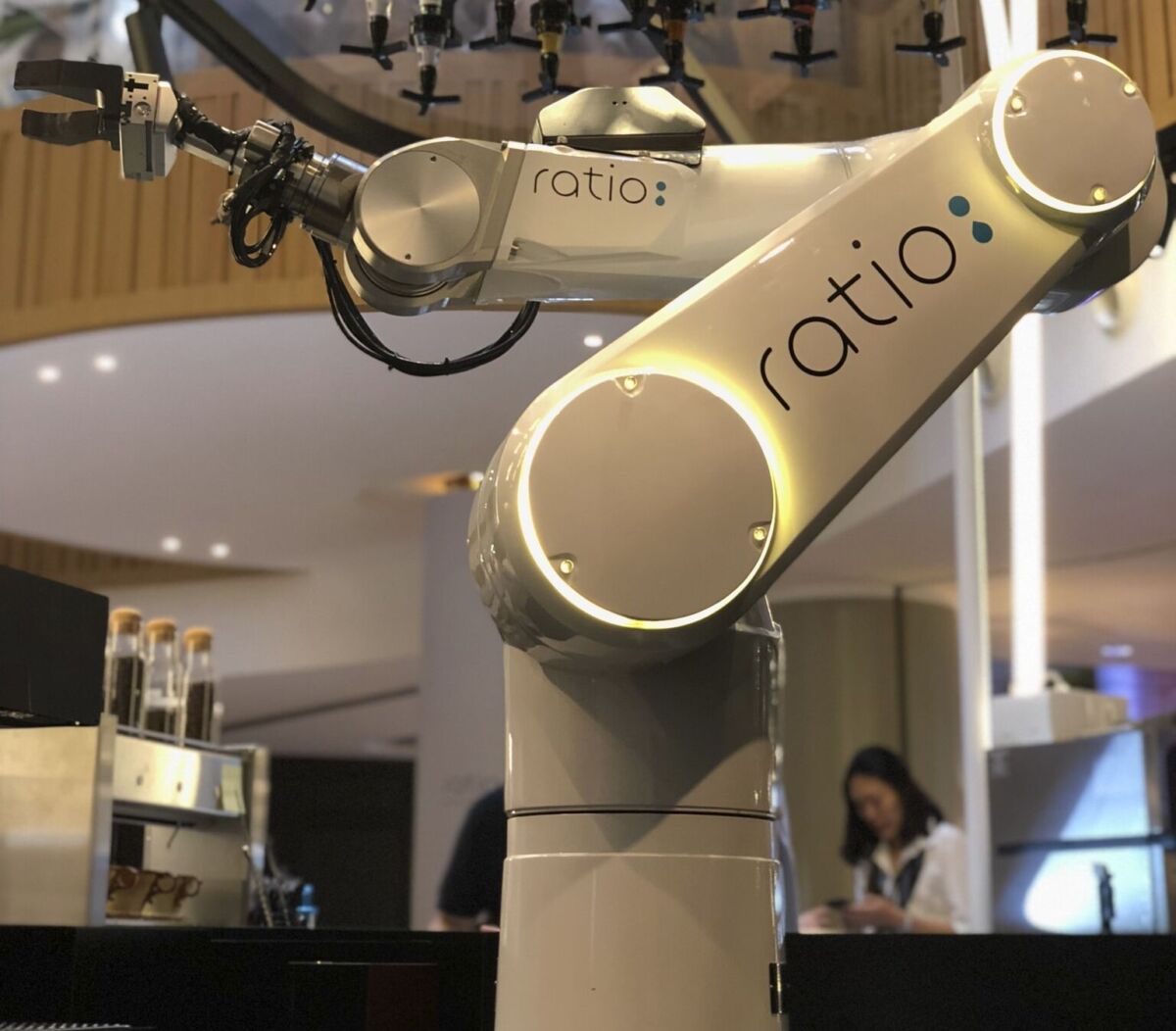 ratio a robotic barista serves coffee